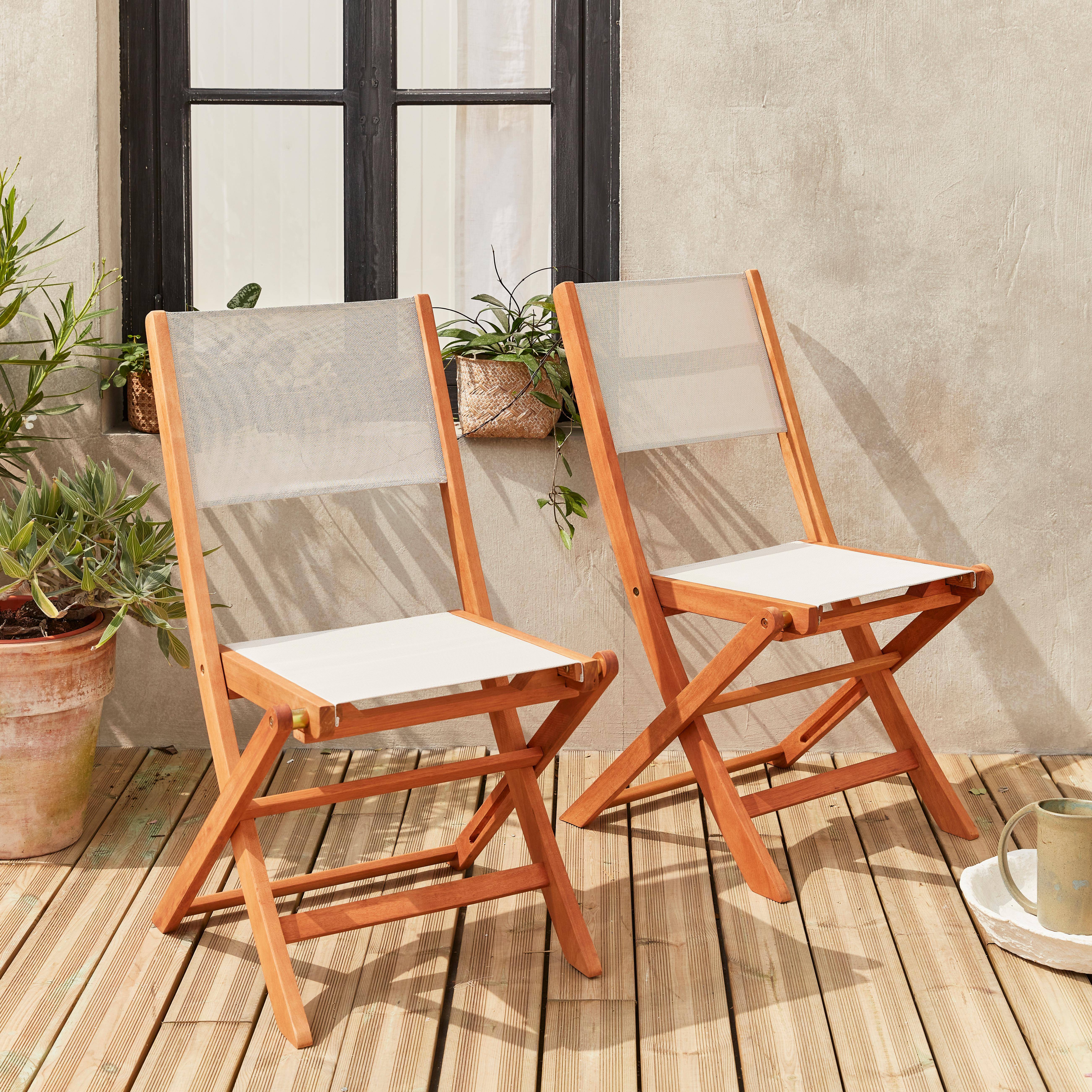 Sedie da giardino, in legno e textilene - modello: Almeria, colore: Bianco - 2 sedie pieghevoli in legno di eucalipto FSC oliato e textilene,sweeek,Photo1