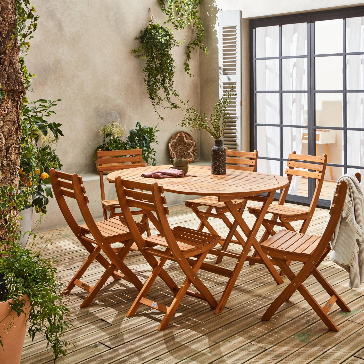 Tavolo da giardino pieghevole da 150 cm in legno di acacia pre-oliato, forma ovale con 6 sedie pieghevoli Photo1