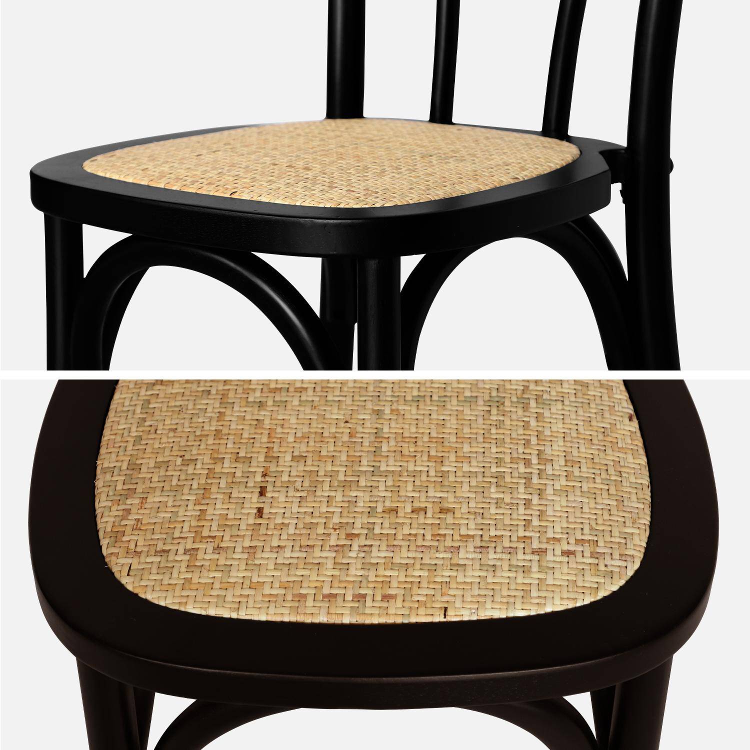 Set van twee zwarte vintage houten stoelen met een rotan zitvlak en afgeronde rugleuning Photo7