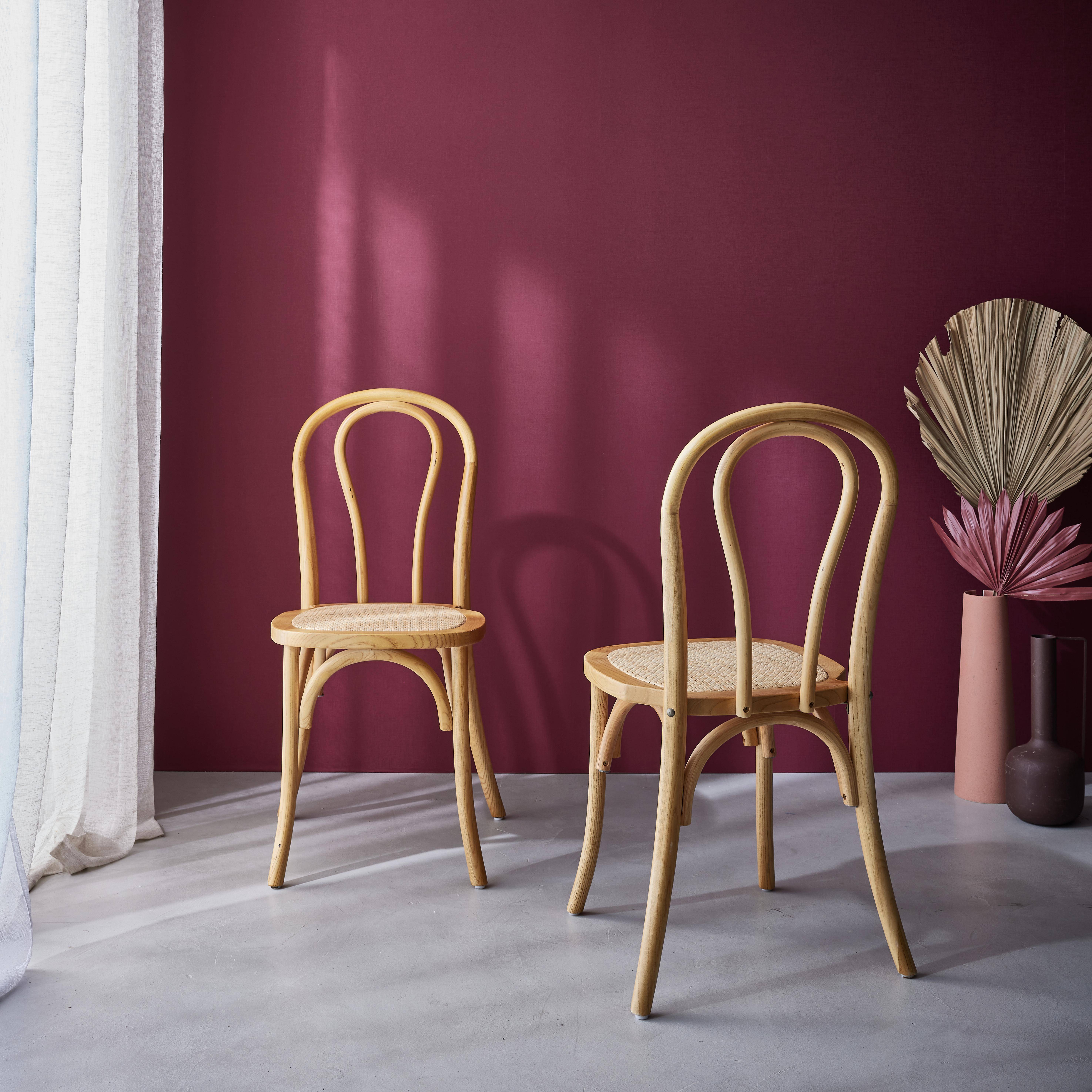 Set van twee vintage houten stoelen met rotan zitvlak en afgeronde rugleuning in natuurlijke houtkleur,sweeek,Photo2