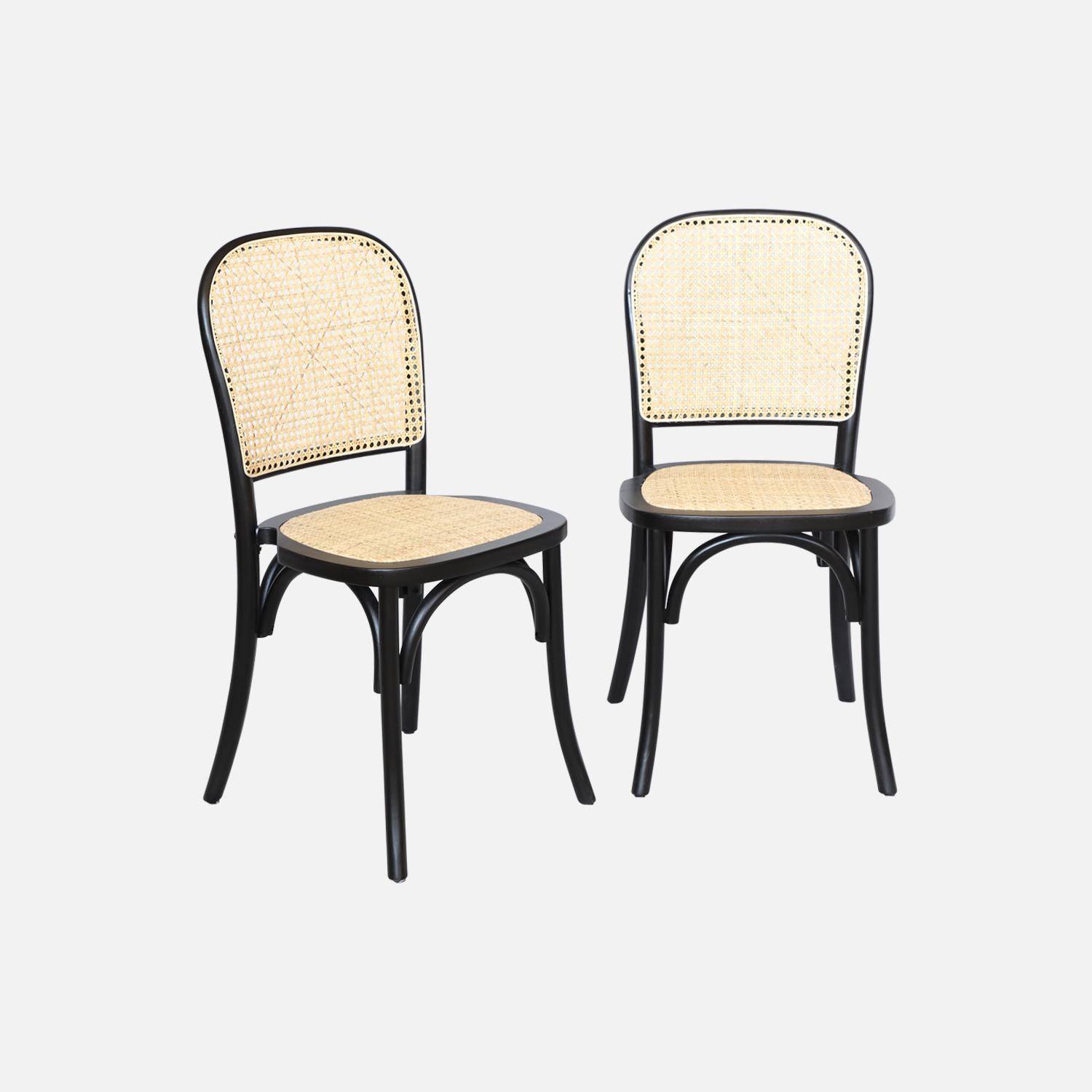 Set van twee vintage zwarte houten stoelen met rotan zitvlak en rugleuning Photo1