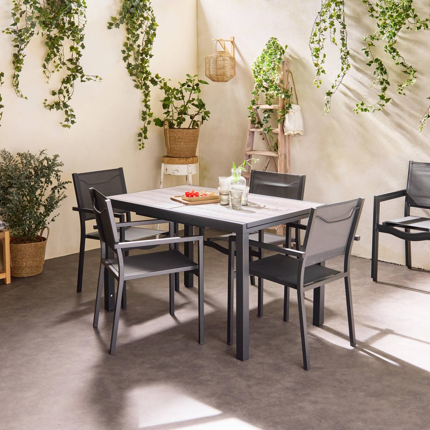 Table de jardin aluminium 120/180cm avec 6 chaises empilables aluminium et textilène Photo2