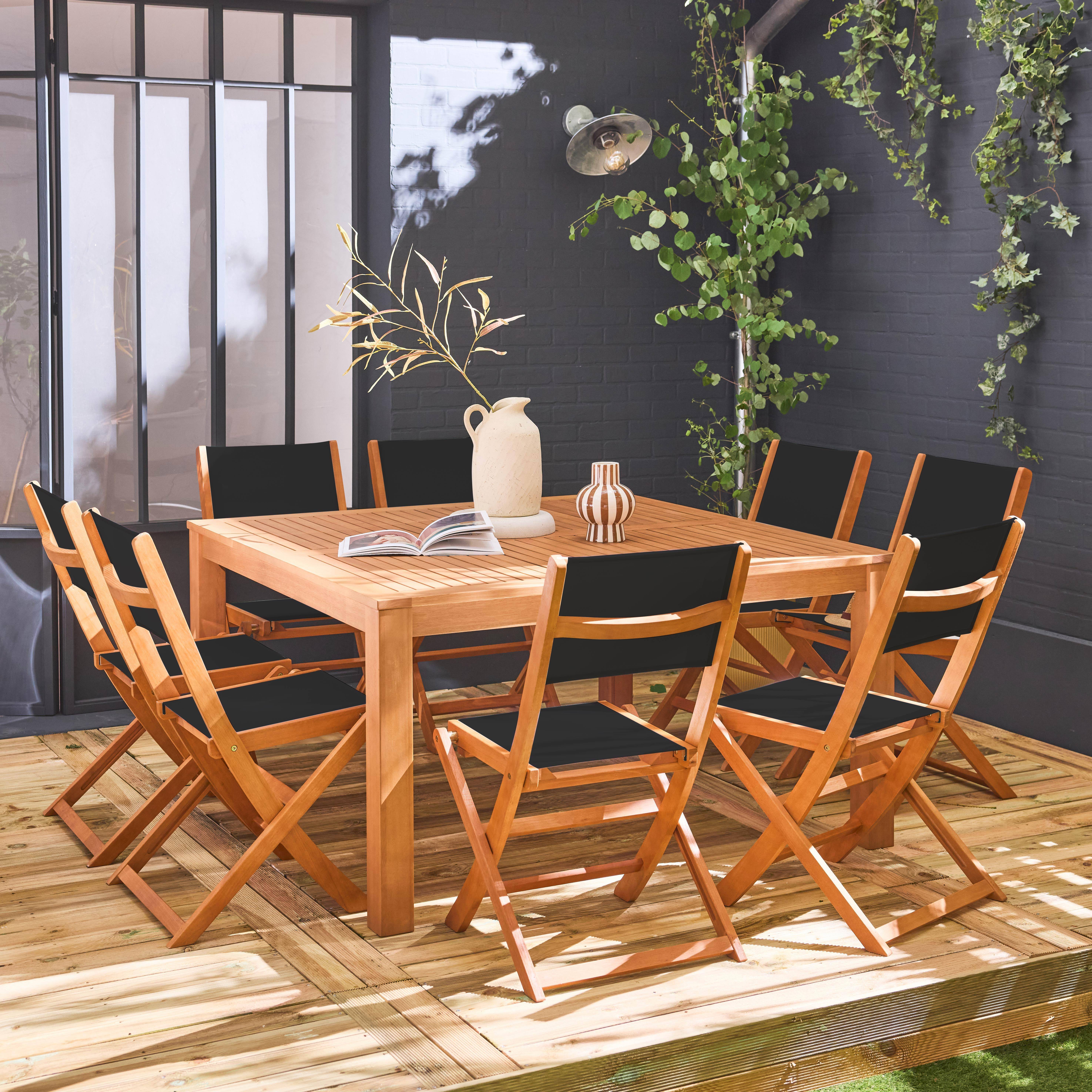 Table de jardin carrée, en bois d'eucalyptus, avec trou de parasol + 8 chaises pliables noir Photo1