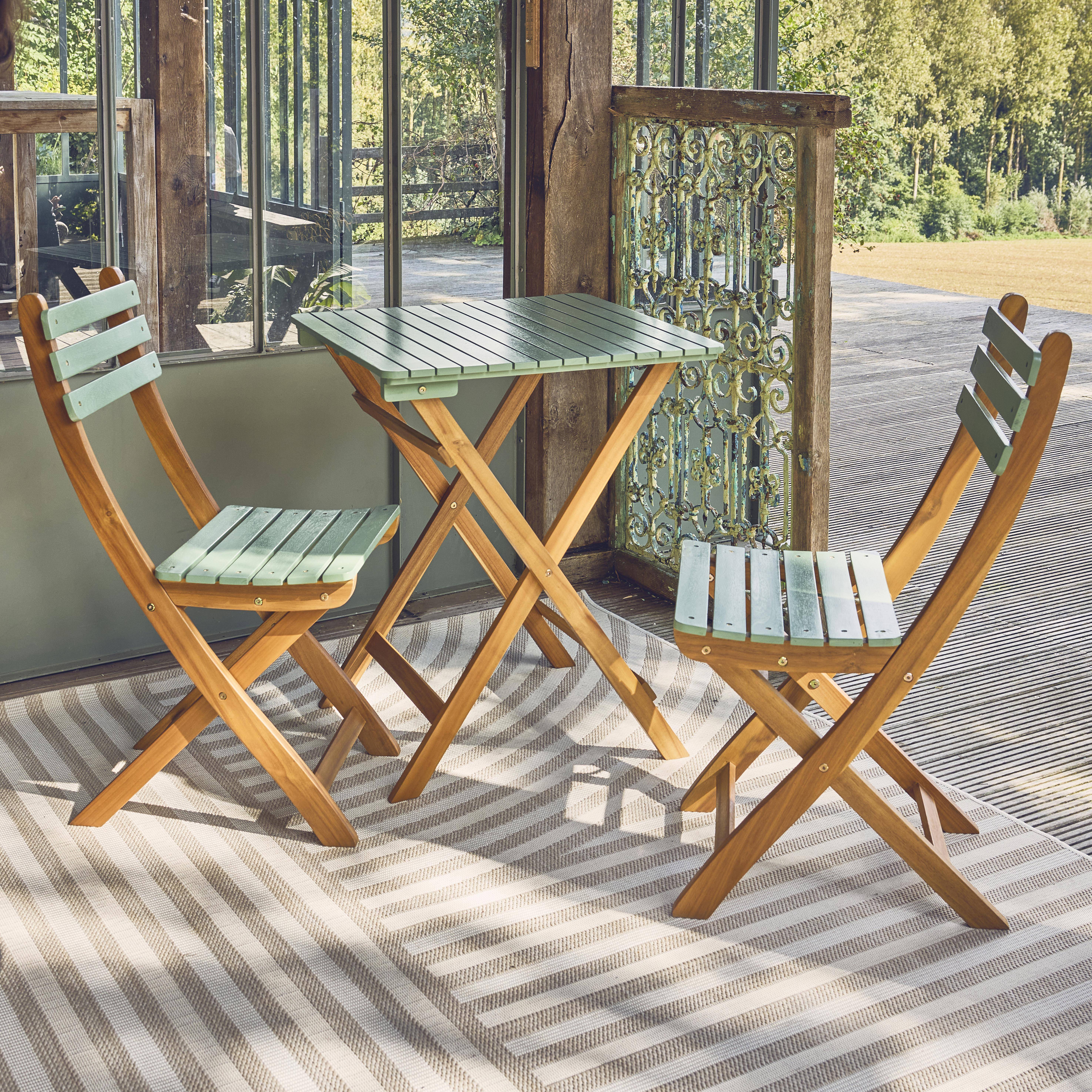 Acacia wood garden table, folding chairs, Sage Green