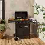 Barbecue BONACIEUX noir et inox au gaz 4 brûleurs avec rangement 2 tablettes rabattables 2 roues PVC Photo1