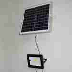 Solar buitenlamp met bewegingsdetector LED 20W met zonnepaneel, afstandsbediening, koud wit, 6000mAh lithiumbatterij, extra krachtige spot 2400 lumen equivalent 150W Photo5