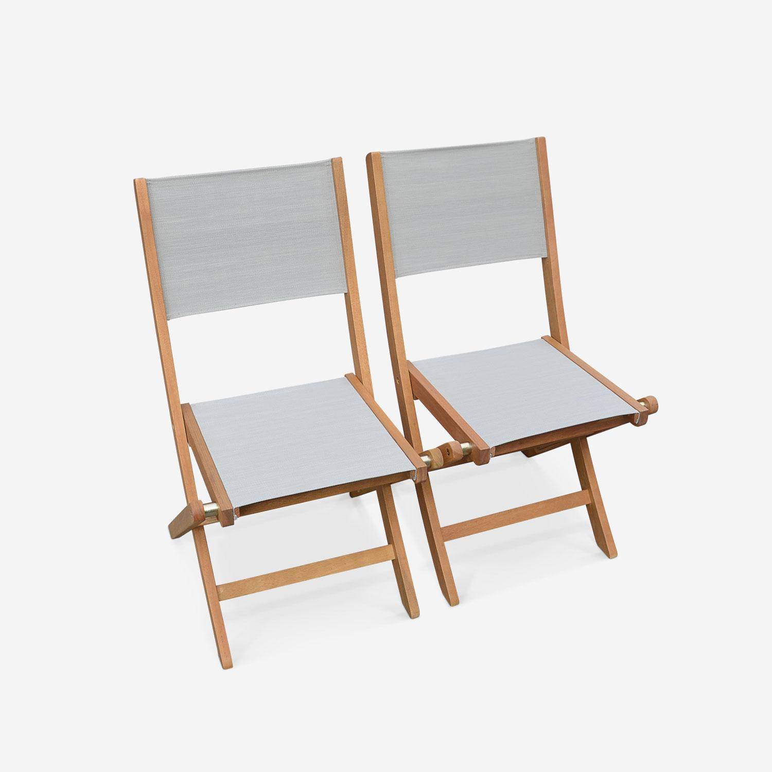 Gartengarnitur aus Holz, großer Tisch 180/240 cm mit Verlängerung, 8 Stühle aus geöltem FSC-Eukalyptusholz und taupegrauem Textilene - Almeria Photo4